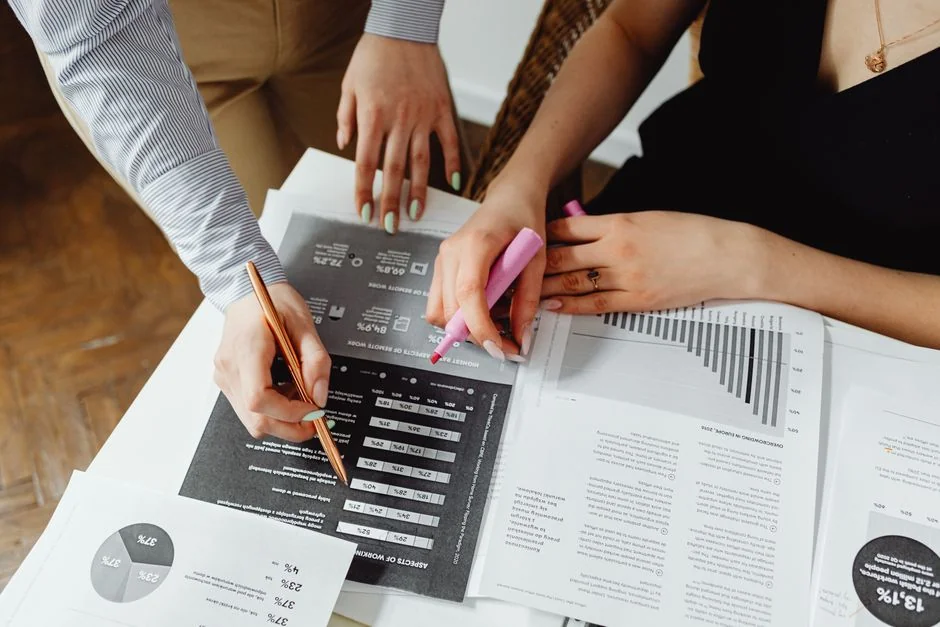 A detailed close-up of a market research document featuring a bar graph and a focus on market trends.
